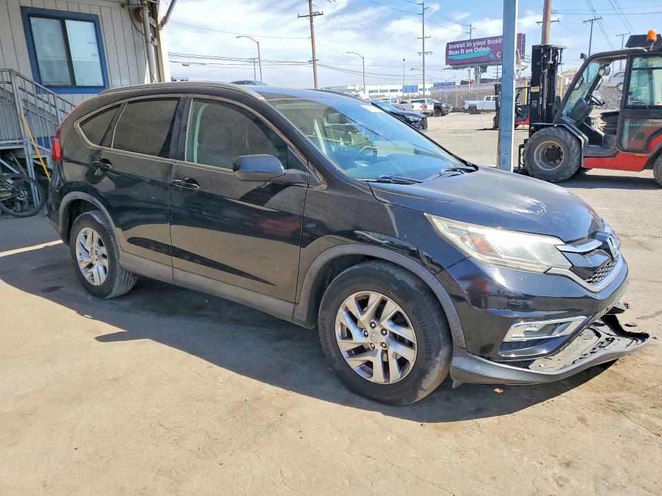 Photo 4 from auction – 2016 HONDA CR-V with VIN 2HKRM3H76GH539931