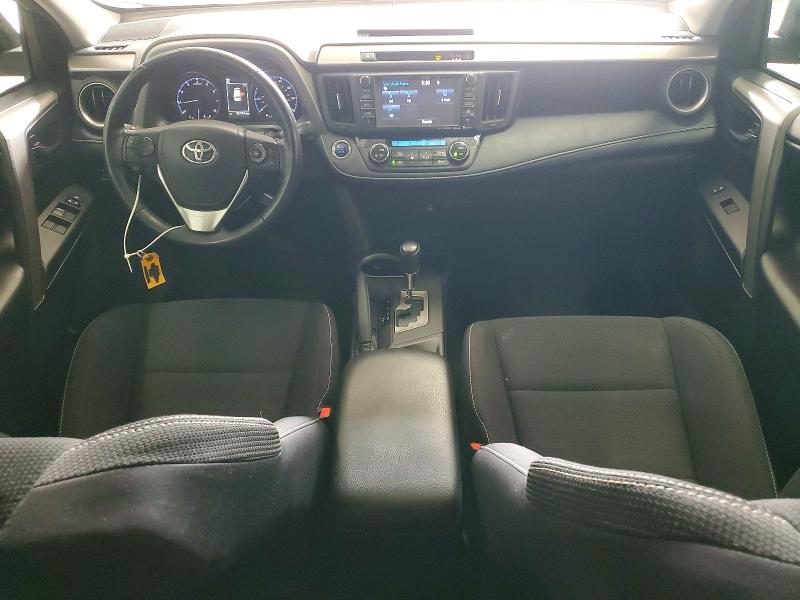 Photo 8 from auction – 2018 TOYOTA RAV4 with VIN 2T3RFREV3JW796397