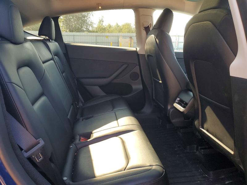 Photo 11 from auction – 2023 TESLA MODEL Y with VIN 7SAYGDEE9PF687729