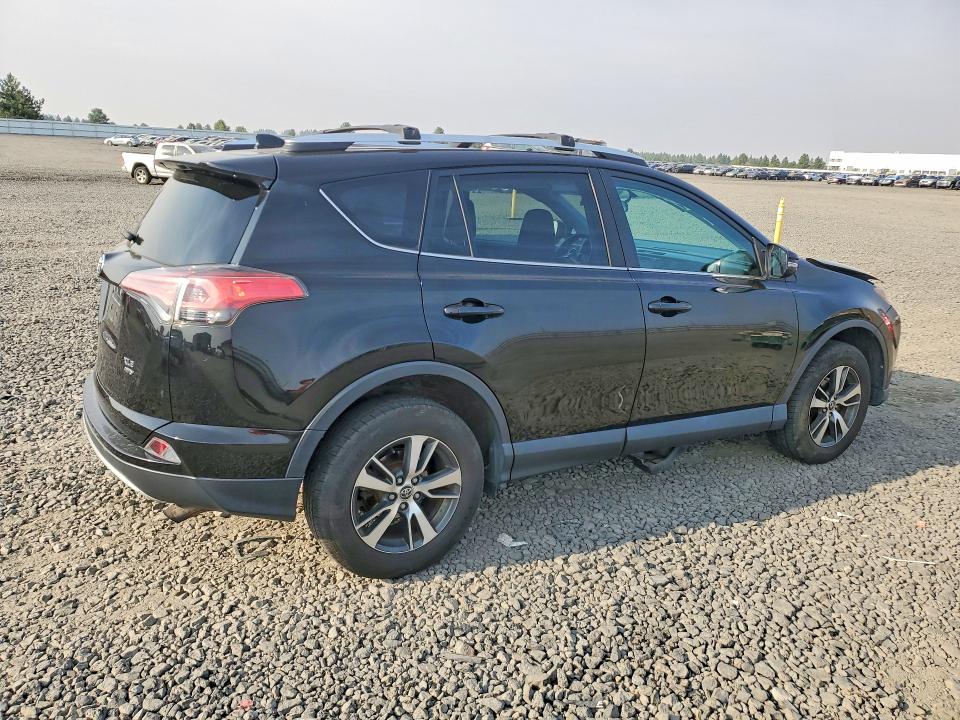 Photo 3 from auction – 2016 TOYOTA RAV4 with VIN 2T3RFREV3GW426026