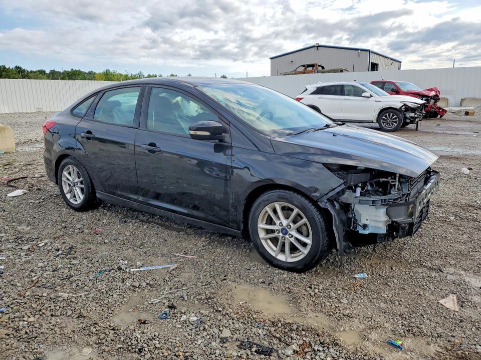Photo 4 from auction – 2015 FORD FOCUS with VIN 1FADP3F29FL200492