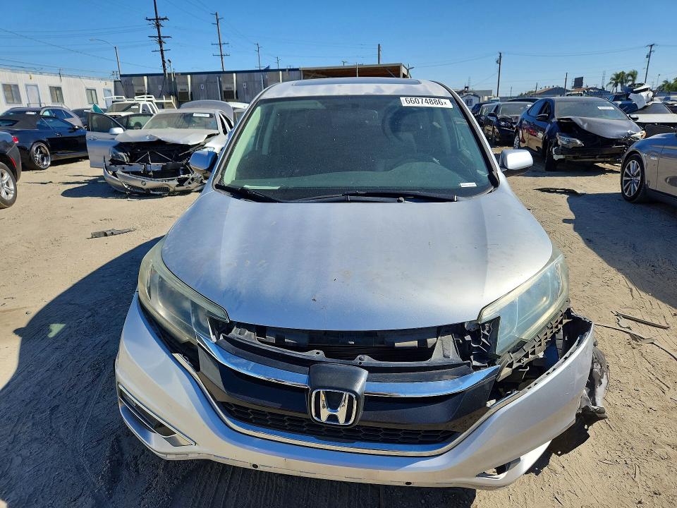 Photo 5 from auction – 2016 HONDA CR-V with VIN 2HKRM3H54GH549498