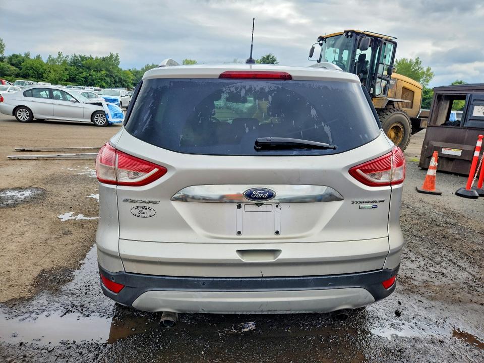 Photo 6 from auction – 2016 FORD ESCAPE with VIN 1FMCU9J92GUA58256