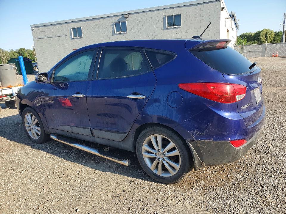 Photo 2 from auction – 2012 HYUNDAI TUCSON with VIN KM8JUCAC2CU517490