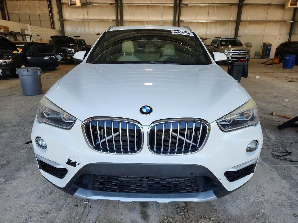 Photo 5 from auction – 2017 BMW X1 with VIN WBXHT3Z35H4A53635