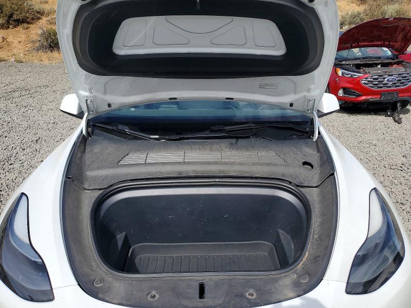 Photo 12 from auction – 2022 TESLA MODEL Y with VIN 7SAYGAEE8NF524419