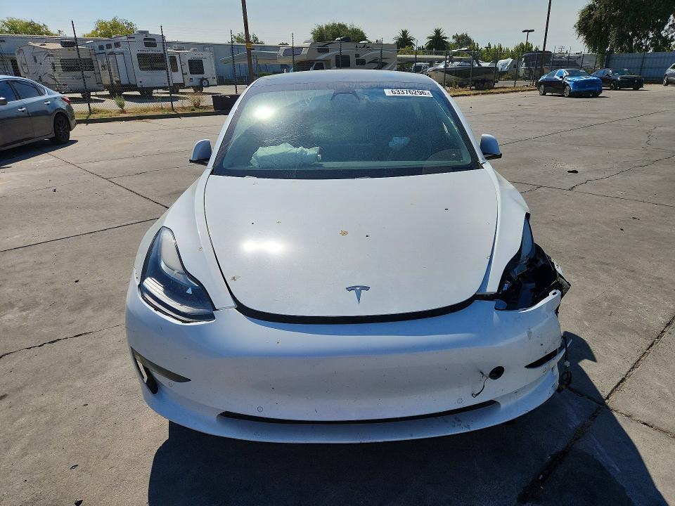 Photo 5 from auction – 2021 TESLA MODEL 3 with VIN 5YJ3E1EA1MF078686