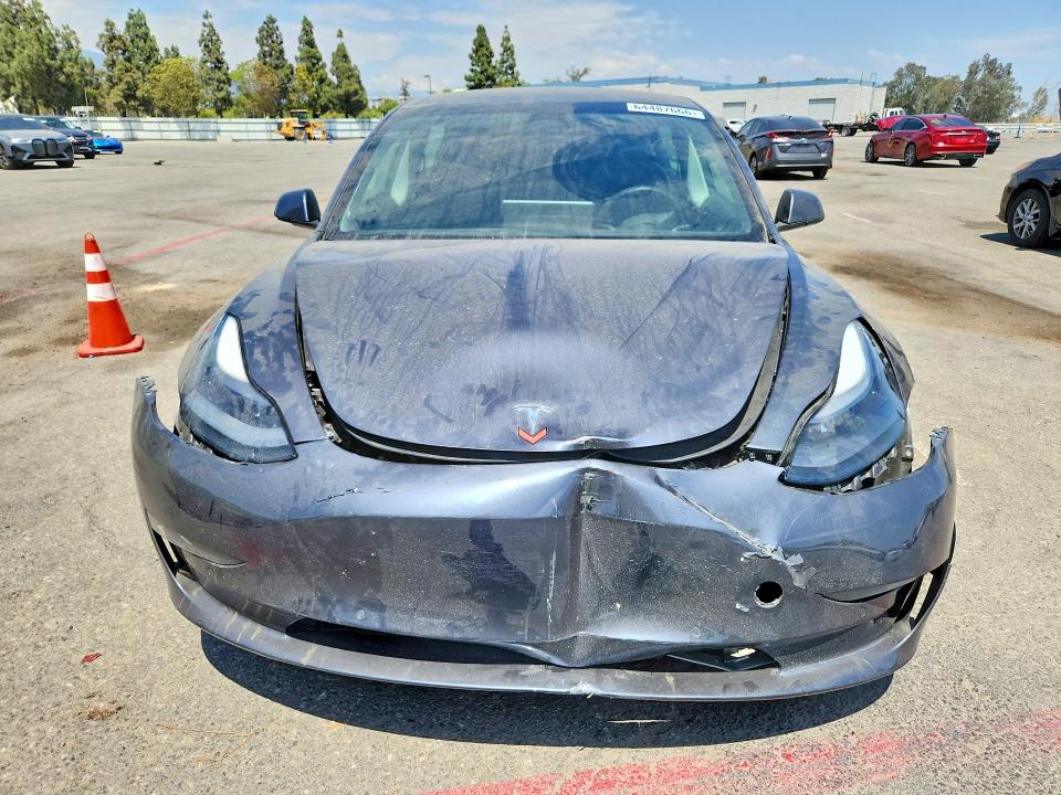 Photo 5 from auction – 2021 TESLA MODEL 3 with VIN 5YJ3E1EAXMF064463