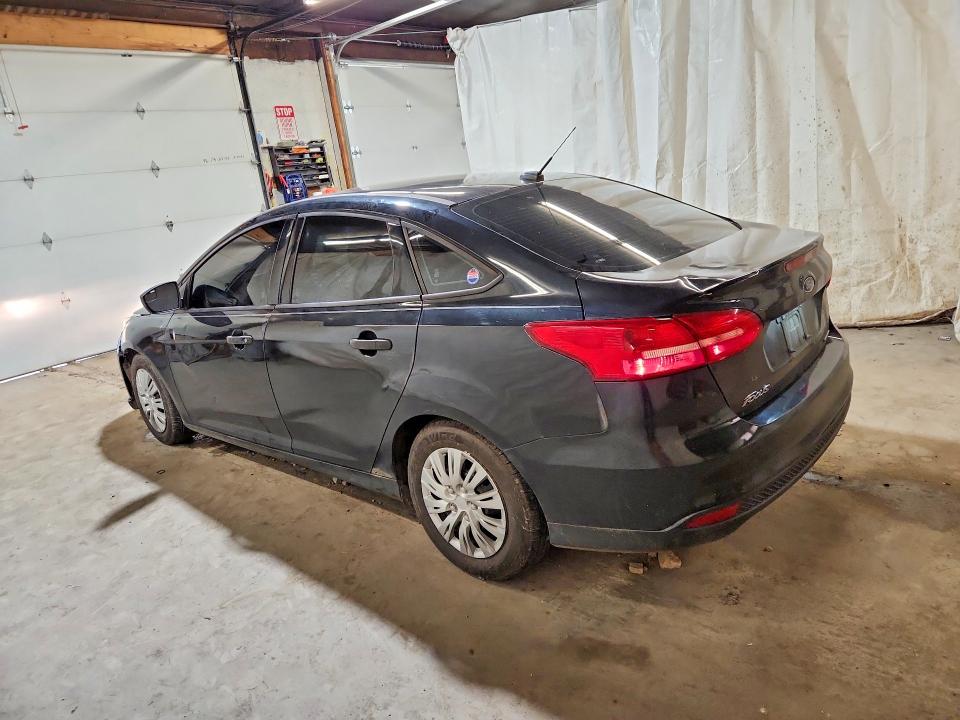 Снимка 2 от търг – 2015 FORD FOCUS с VIN 1FADP3E21FL226537