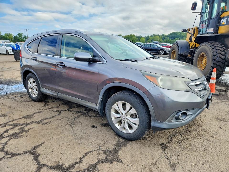 Photo 4 from auction – 2012 HONDA CR-V with VIN JHLRM4H7XCC023165