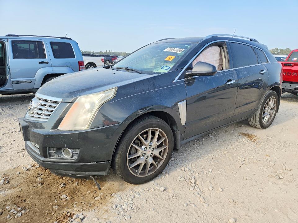 CADILLAC SRX 2014 with VIN 3GYFNDE36ES665694 - Photo from auction