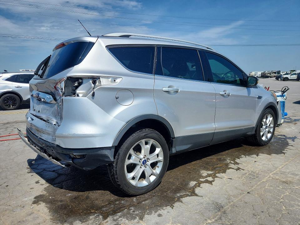 Photo 3 from auction – 2014 FORD ESCAPE with VIN 1FMCU0J94EUE51359