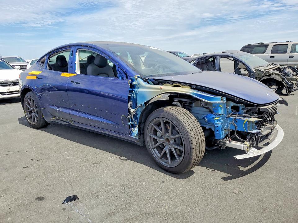 Photo 4 from auction – 2023 TESLA MODEL 3 with VIN 5YJ3E1EA1PF487632
