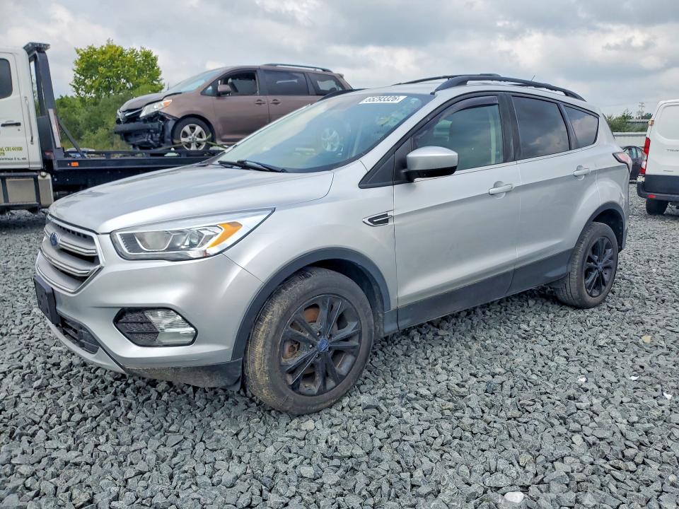 FORD ESCAPE 2017 with VIN 1FMCU9GD1HUD06686 - Photo from auction