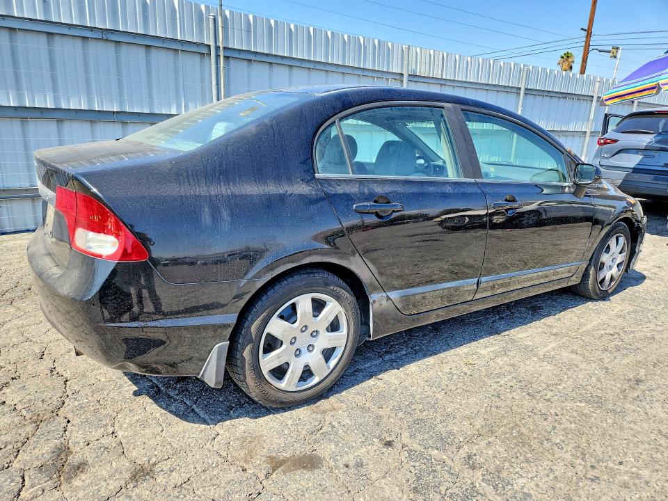 Photo 3 from auction – 2010 HONDA CIVIC with VIN 19XFA1F50AE045710