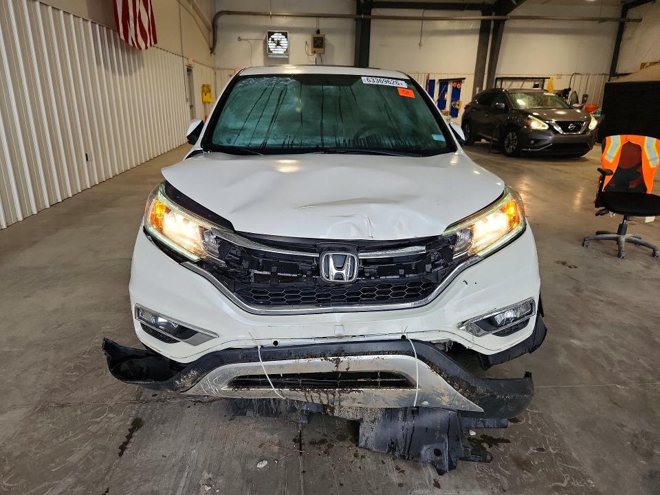 Foto 5 de la subasta – 2016 HONDA CR-V con VIN 5J6RM3H50GL017204