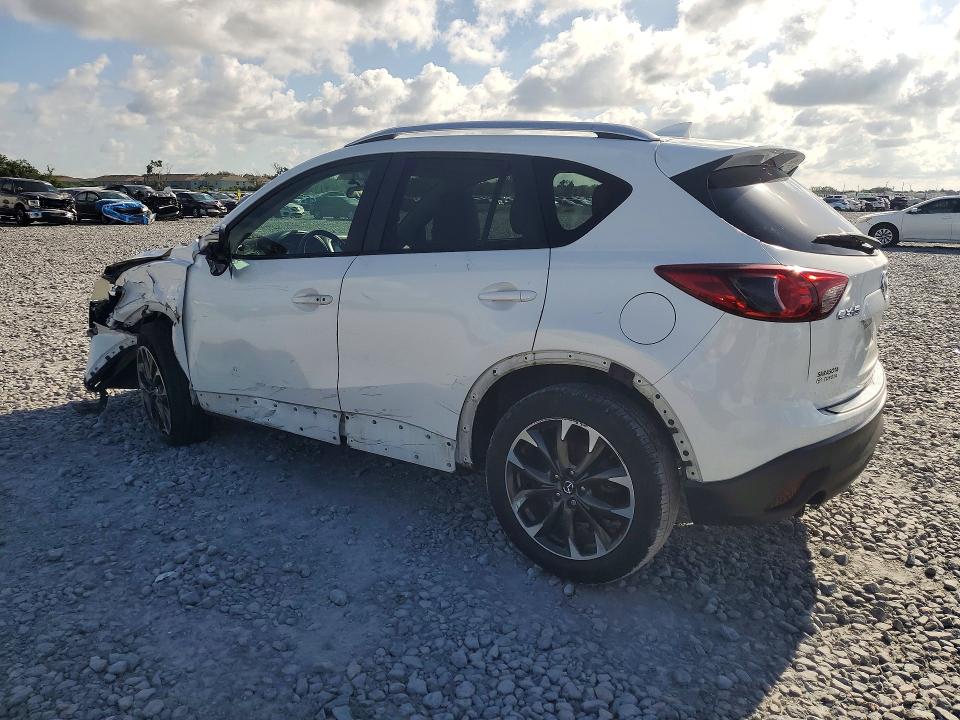 Photo 2 from auction – 2016 MAZDA CX-5 with VIN JM3KE2DYXG0618725