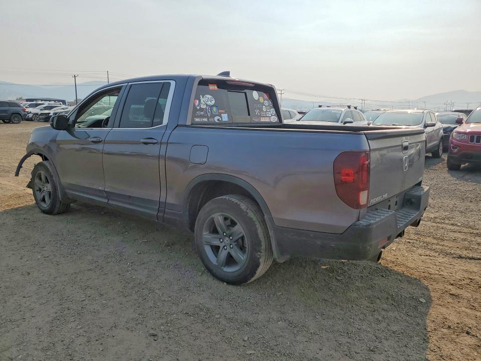 Photo 2 from auction – 2023 HONDA RIDGELINE with VIN 5FPYK3F57PB007225