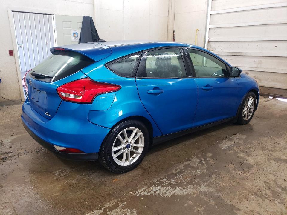Photo 3 from auction – 2016 FORD FOCUS with VIN 1FADP3K23GL201080