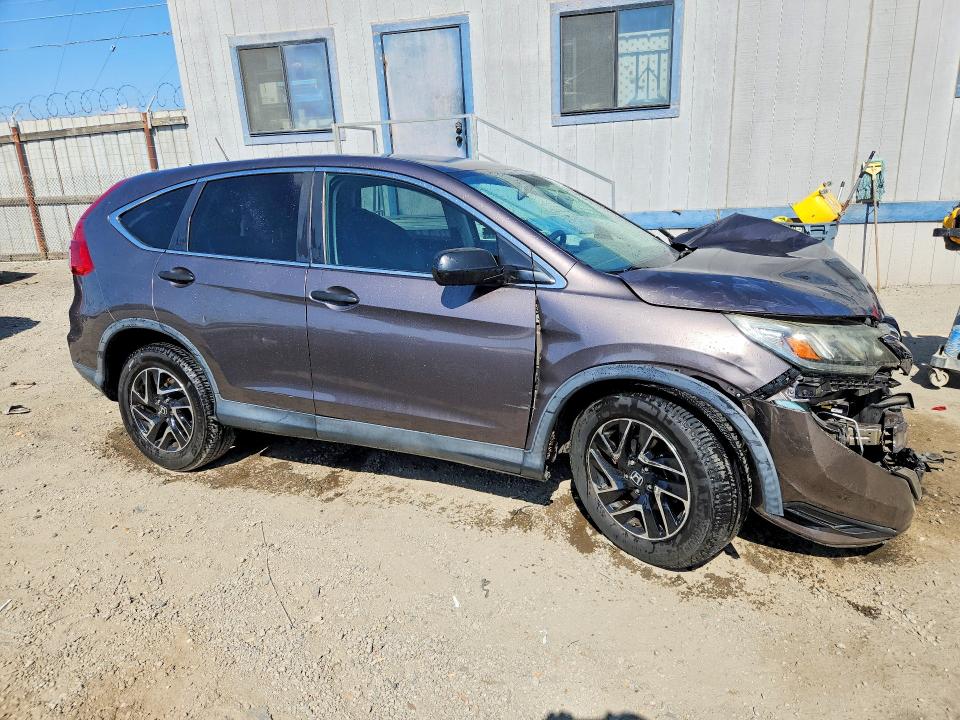 Photo 4 from auction – 2016 HONDA CR-V with VIN 2HKRM3H48GH559572