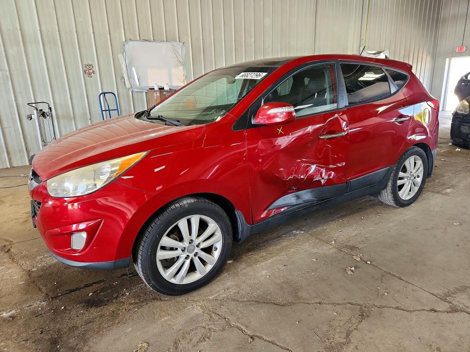 HYUNDAI TUCSON 2012 with VIN KM8JU3AC5CU343608 - Photo from auction
