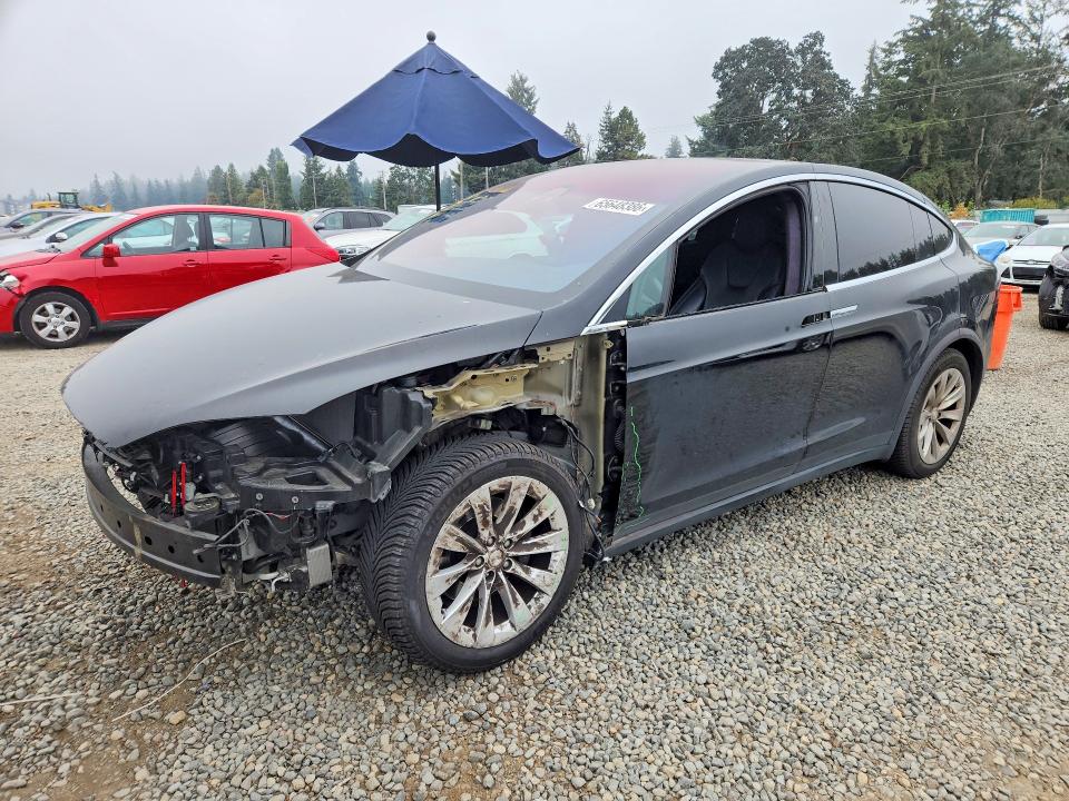 TESLA MODEL X 2020 with VIN 5YJXCDE22LF239692 - Photo from auction
