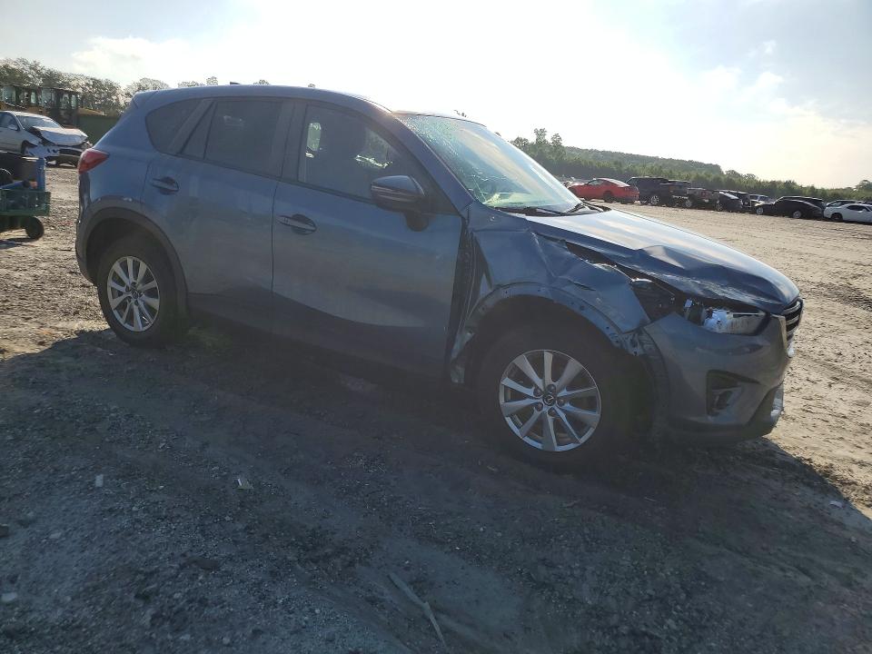 Photo 4 from auction – 2016 MAZDA CX-5 with VIN JM3KE4CY7G0676546