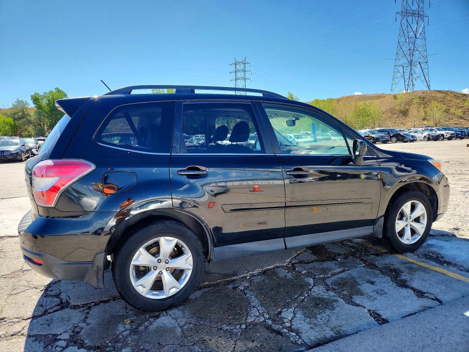 Photo 3 from auction – 2014 SUBARU FORESTER with VIN JF2SJAJC7EH417582