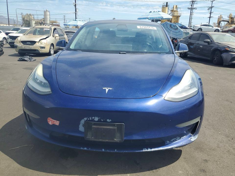 Photo 5 from auction – 2018 TESLA MODEL 3 with VIN 5YJ3E1EA4JF040896