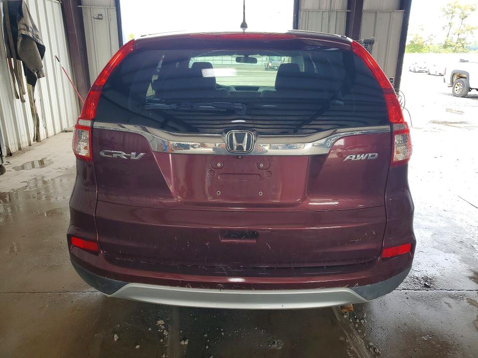 Photo 6 from auction – 2015 HONDA CR-V with VIN 2HKRM4H52FH606706