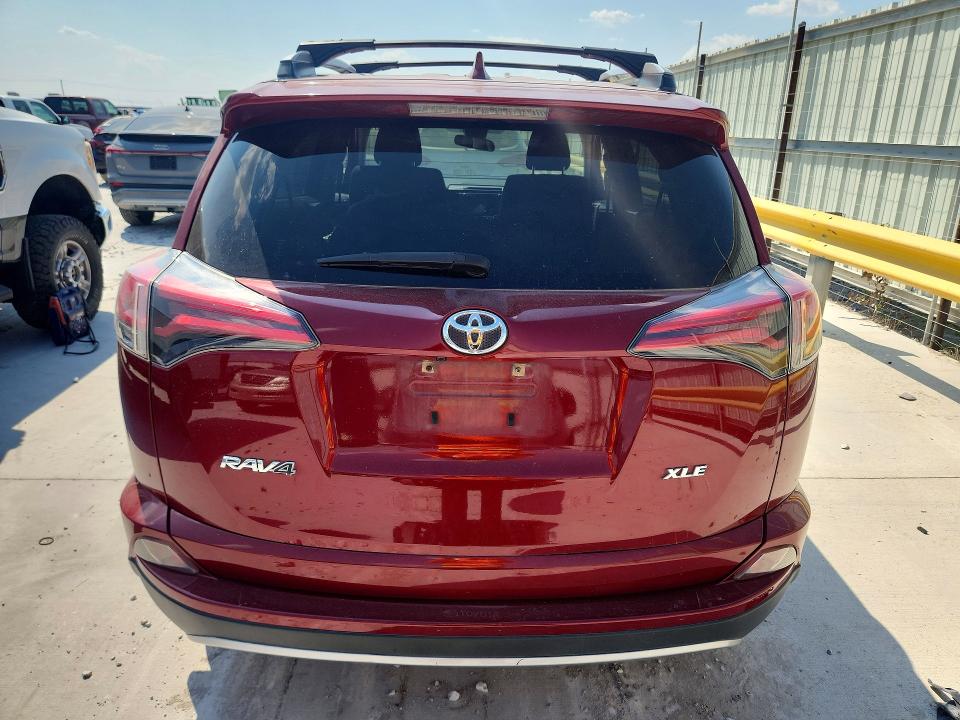Photo 6 from auction – 2018 TOYOTA RAV4 with VIN JTMWFREV5JD124342