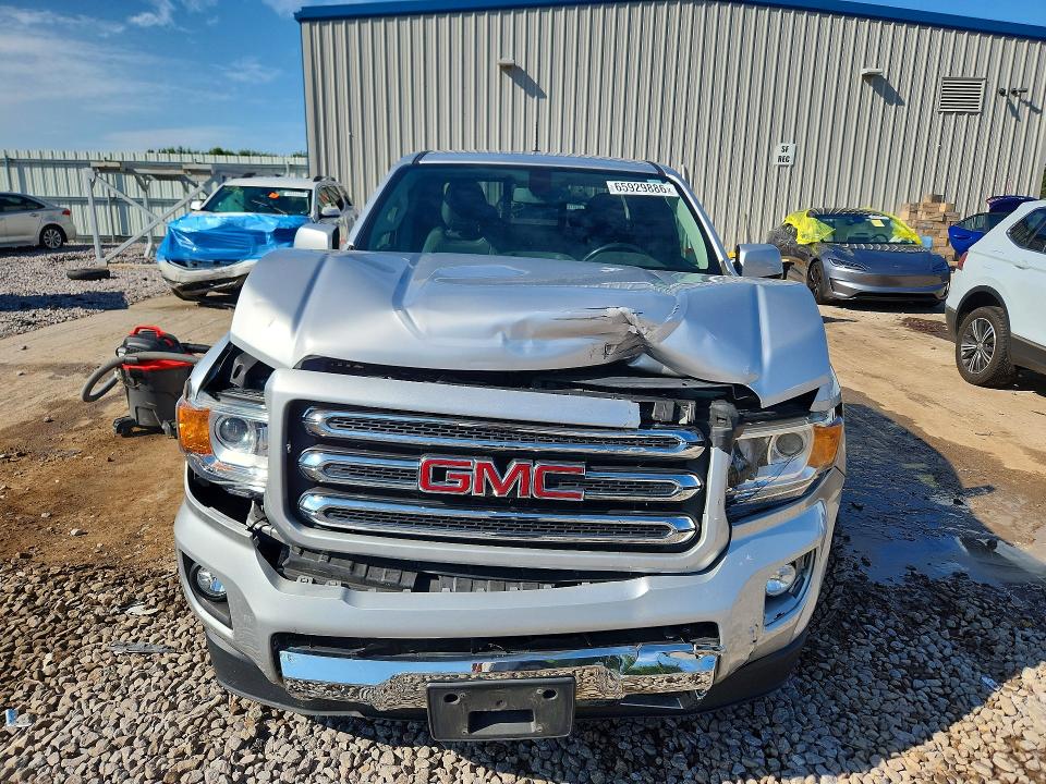 Photo 5 from auction – 2016 GMC CANYON with VIN 1GTH6CE34G1342240