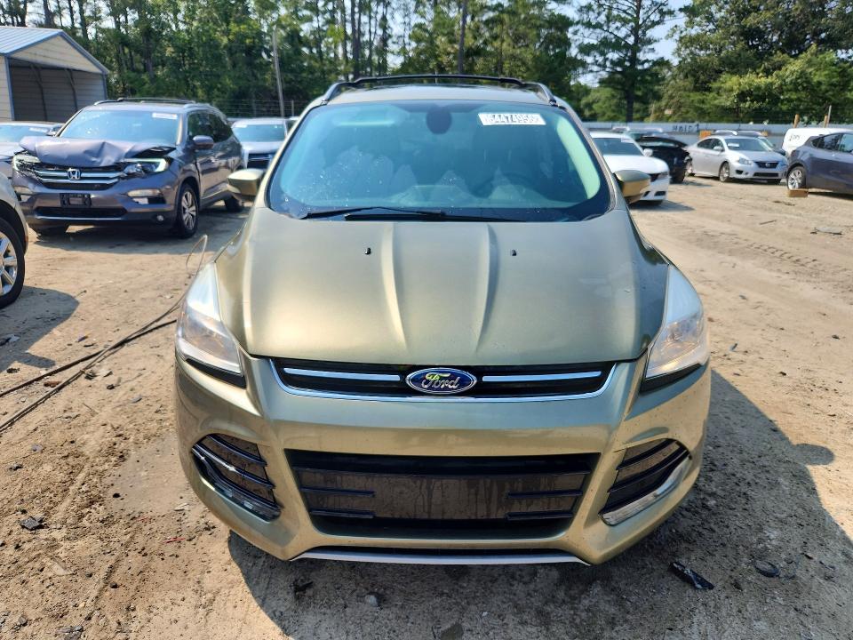 Foto 5 de la subasta – 2013 FORD ESCAPE con VIN 1FMCU0H93DUD31895