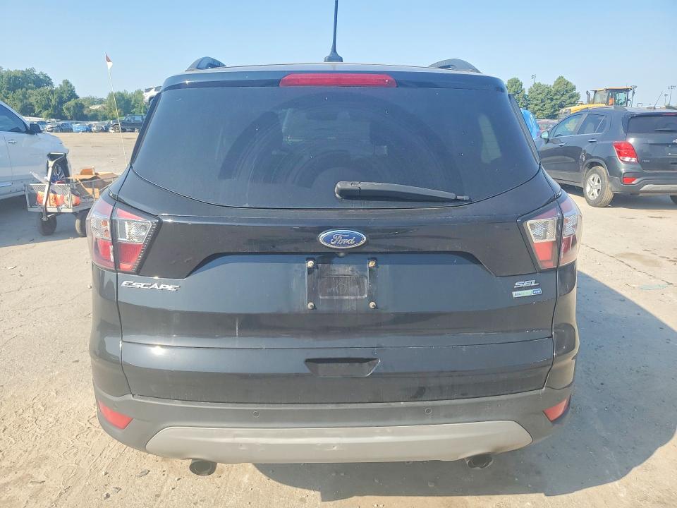 Photo 6 from auction – 2018 FORD ESCAPE with VIN 1FMCU9HD0JUA91418