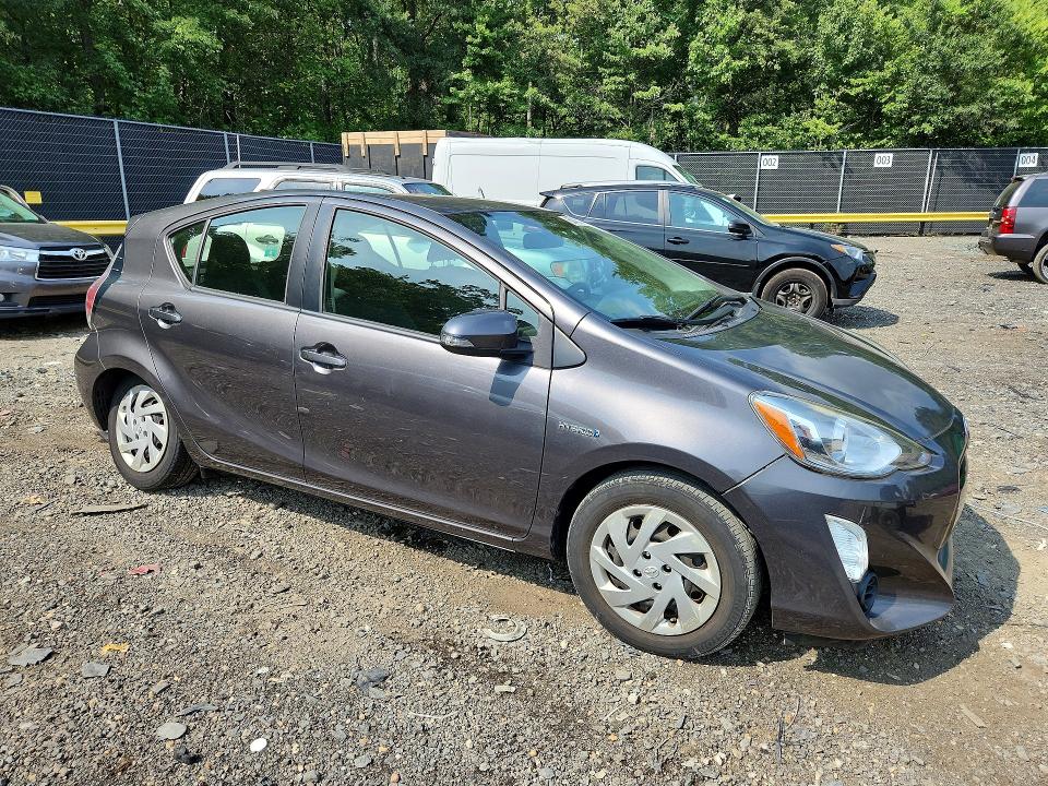 Photo 4 from auction – 2015 TOYOTA PRIUS C with VIN JTDKDTB33F1583527
