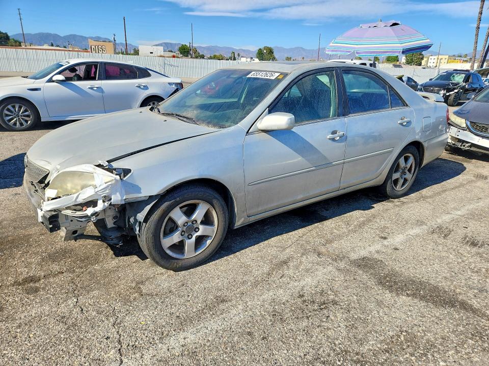 TOYOTA CAMRY 2003 with VIN 4T1BF32K93U559787 - Photo from auction