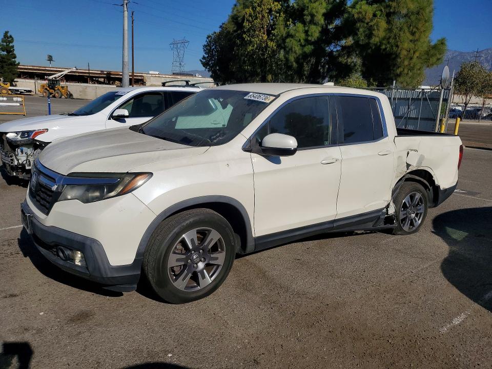 HONDA RIDGELINE 2018 with VIN 5FPYK2F69JB000612 - Photo from auction