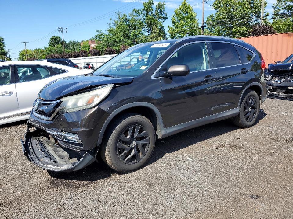 Photo 1 from auction – 2015 HONDA CR-V with VIN 2HKRM4H75FH627616