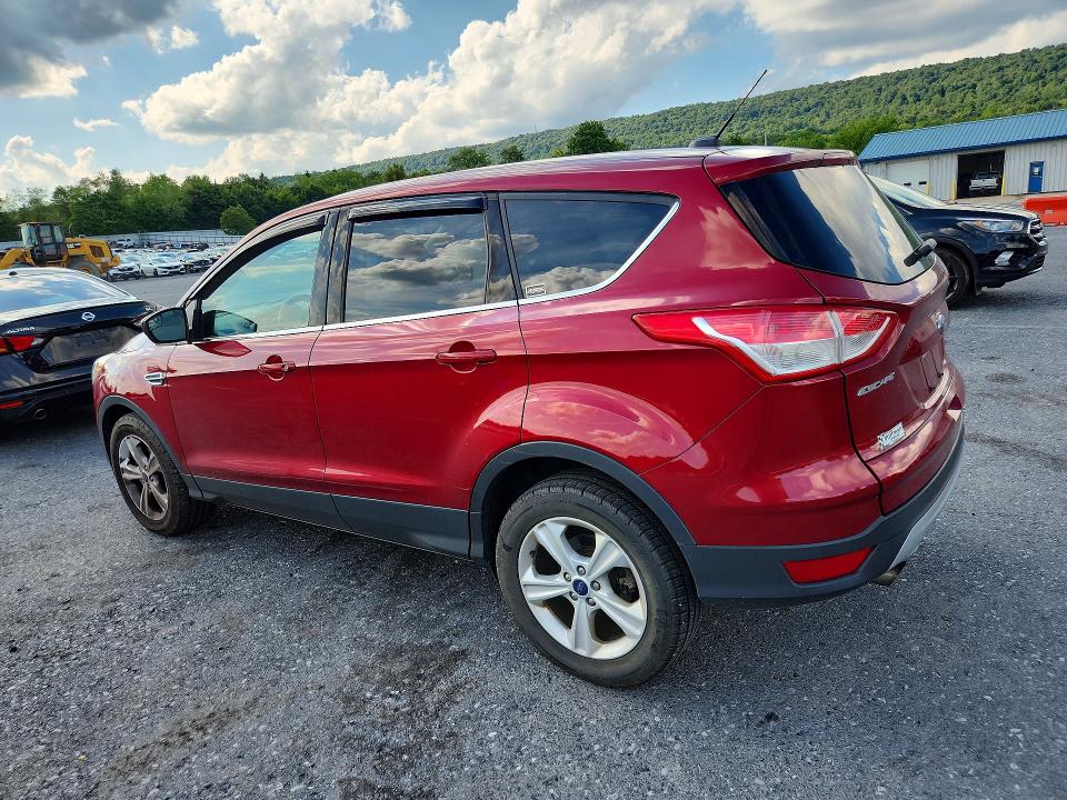 Photo 2 from auction – 2016 FORD ESCAPE with VIN 1FMCU9GX5GUA93587