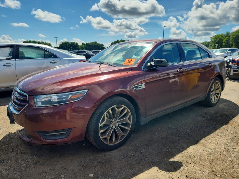 FORD TAURUS 2015 with VIN 1FAHP2F85FG152076 - Photo from auction