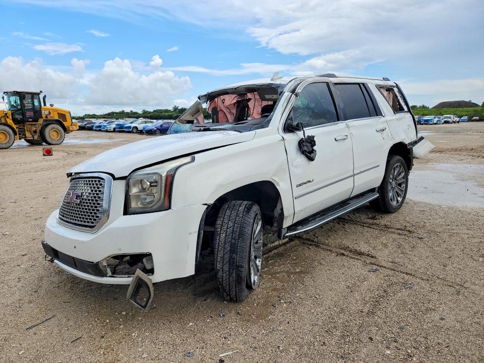 GMC YUKON 2016 with VIN 1GKS1CKJXGR208264 - Photo from auction