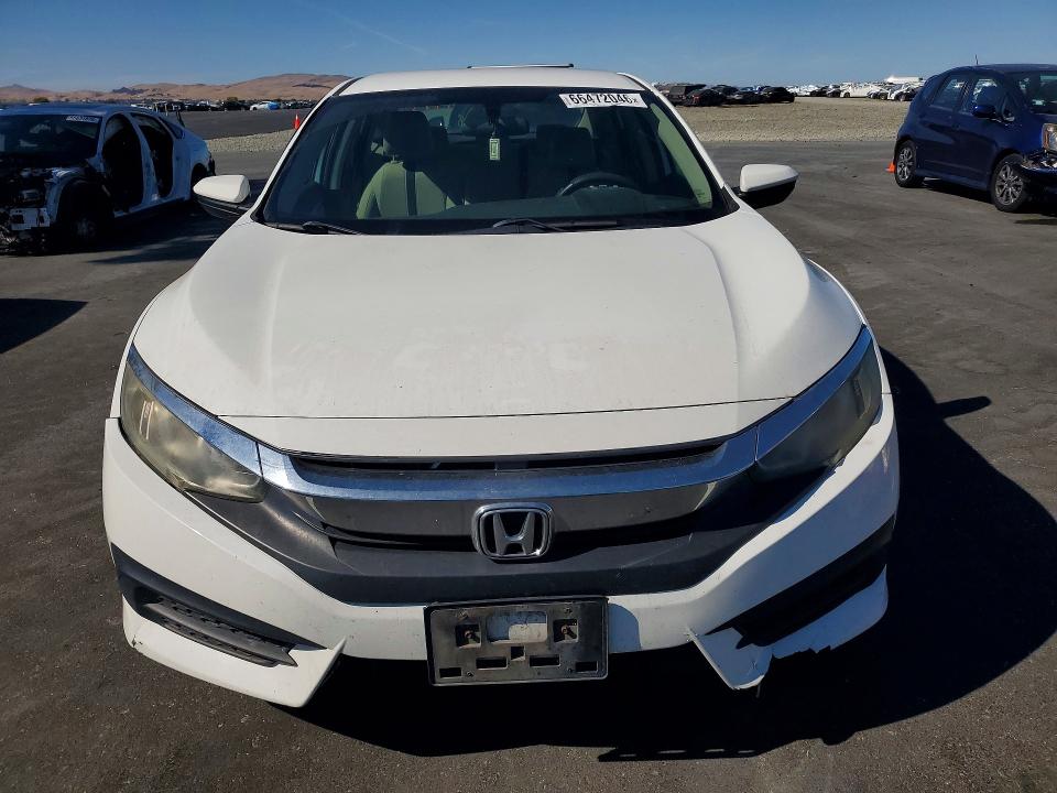 Photo 5 from auction – 2016 HONDA CIVIC with VIN 19XFC2F58GE209987