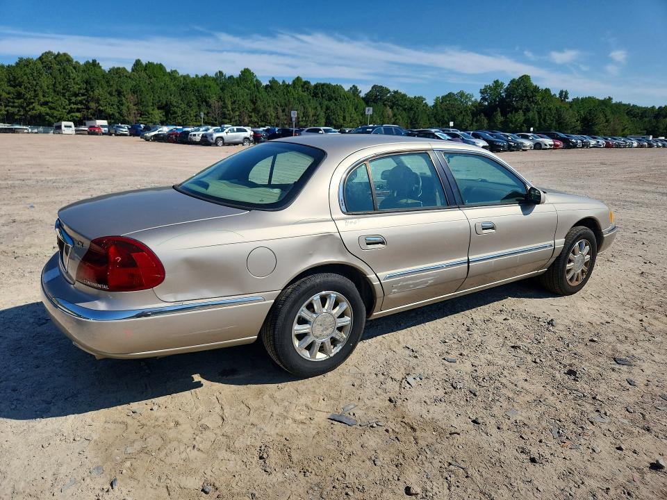 Photo 3 from auction – 2002 LINCOLN CONTINENTAL with VIN 1LNHM97V52Y700089
