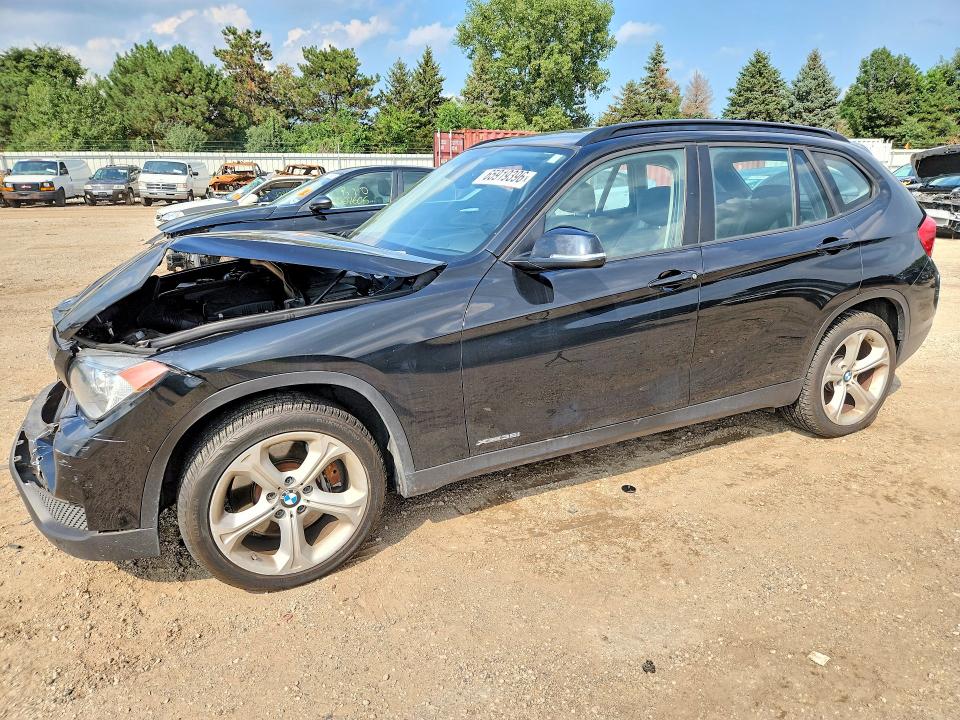 BMW X1 2013 with VIN WBAVM5C57DVV91092 - Photo from auction
