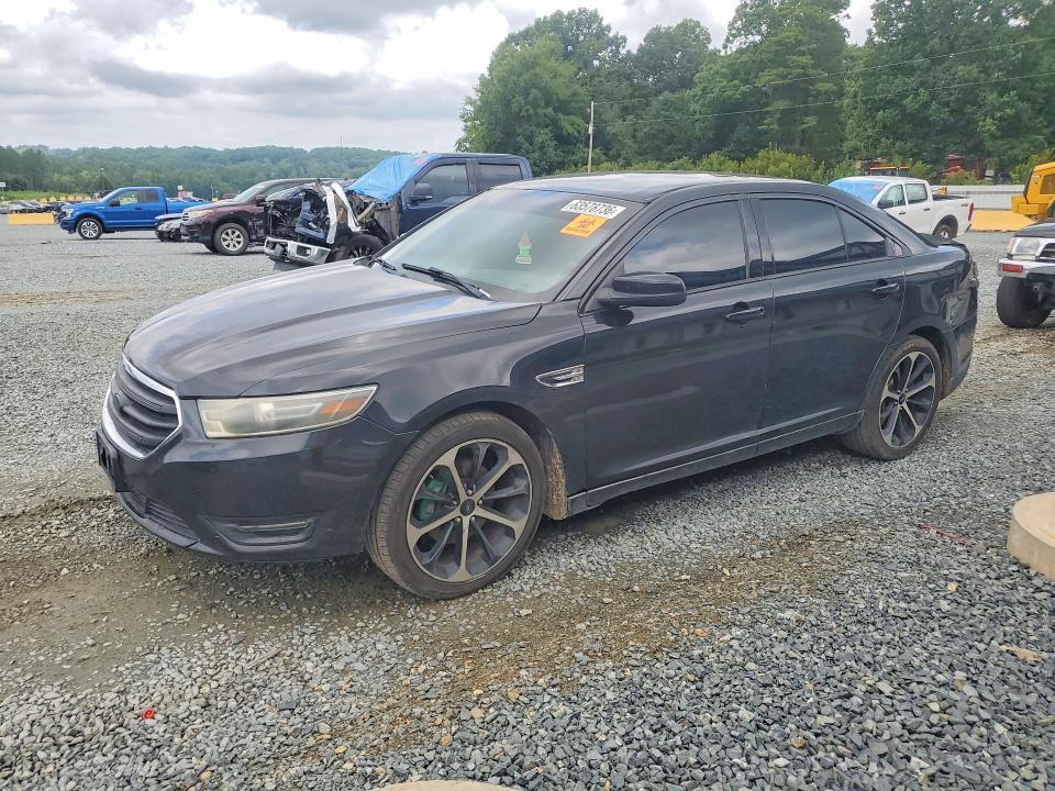 FORD TAURUS 2014 with VIN 1FAHP2E89EG184691 - Photo from auction