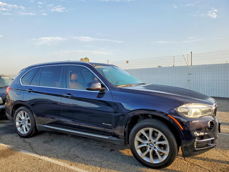 Photo 4 from auction – 2014 BMW X5 with VIN 5UXKR0C51E0H24052