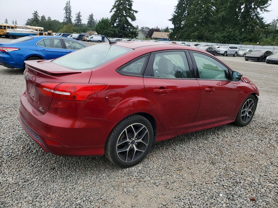 Photo 3 from auction – 2015 FORD FOCUS with VIN 1FADP3F24FL275195