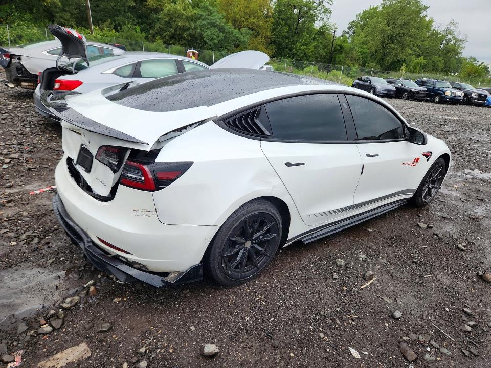 Photo 3 from auction – 2021 TESLA MODEL 3 with VIN 5YJ3E1EB4MF858593