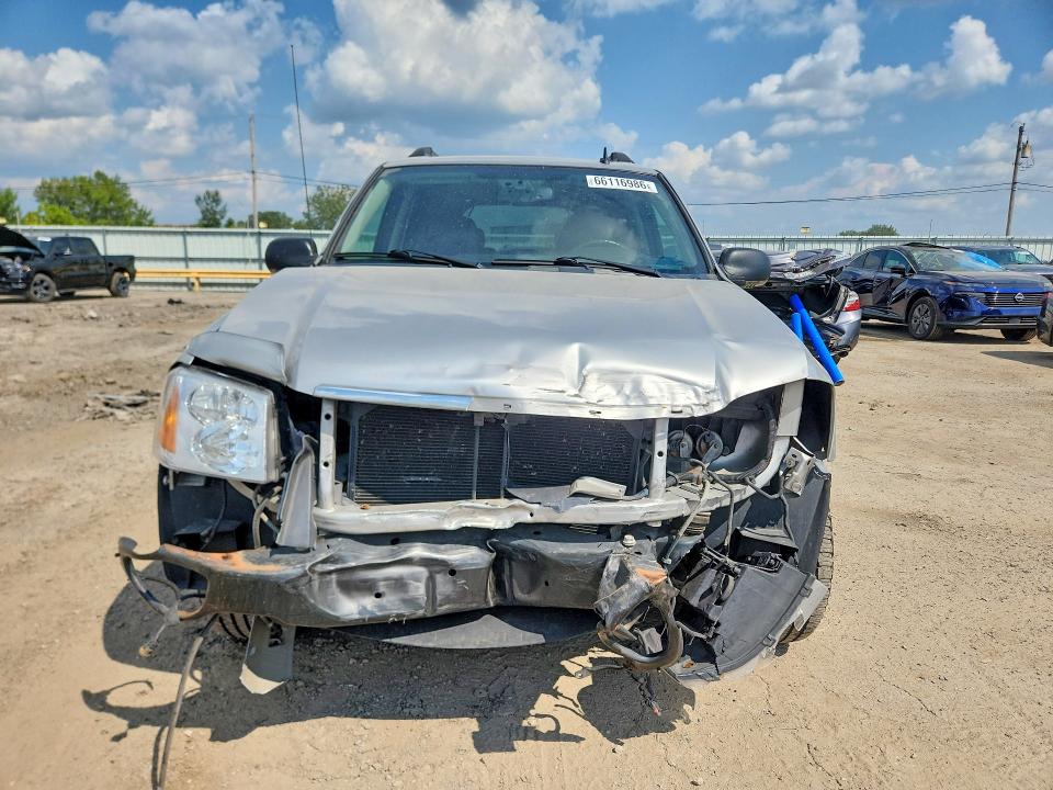 Foto 5 de la subasta – 2006 GMC ENVOY con VIN 1GKET16S066123724