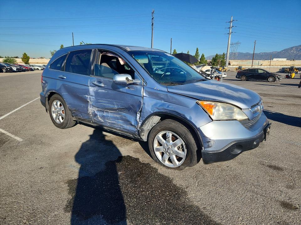 Photo 4 from auction – 2007 HONDA CR-V with VIN JHLRE38727C002338